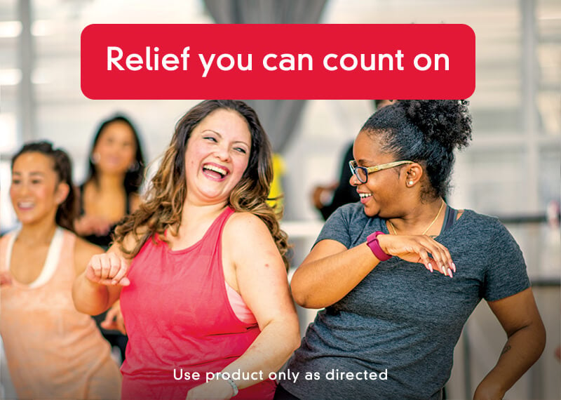 Two women dancing happily with a text banner of “Relief you can count on”