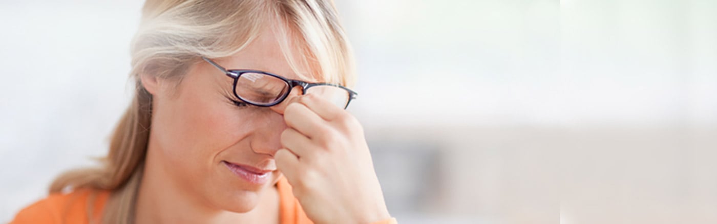 Woman suffering from a headache