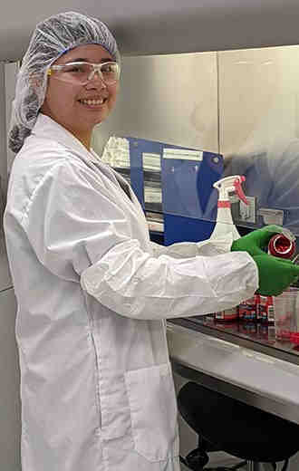 Guelph plant worker holder a bottle of Tylenol